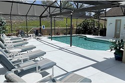 Lots of sun beds, chairs and tables