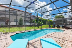 Pool Area with Sun Loungers and Seating
