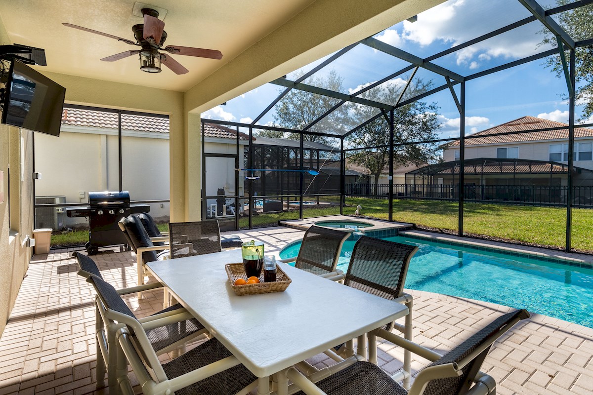 The lanai has a new smart TV, ceiling fans, & barbequ