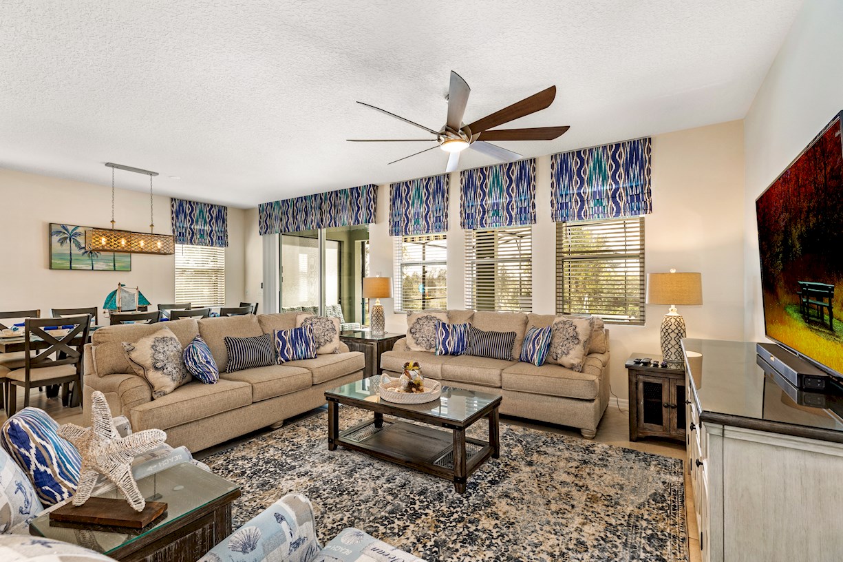 spacious family room with views to the pool