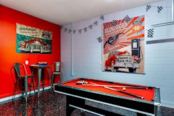 Gameroom with pool/ping pong table 