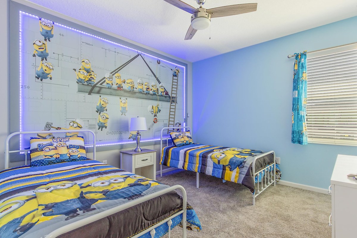 [Bedroom #6] Custom Minions room with twin beds & 40” Smart TV. Complete with an LED controller to change the color of the lights!