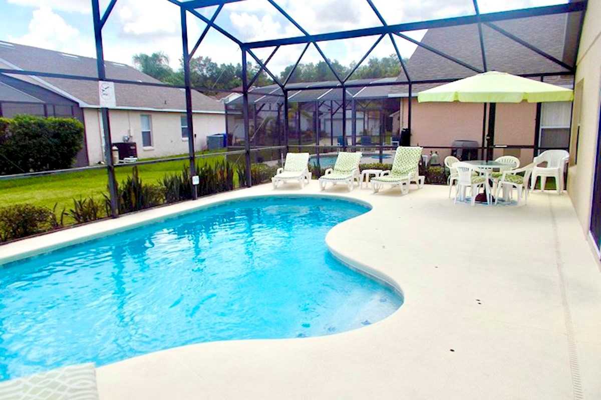 Large pool deck with loungers