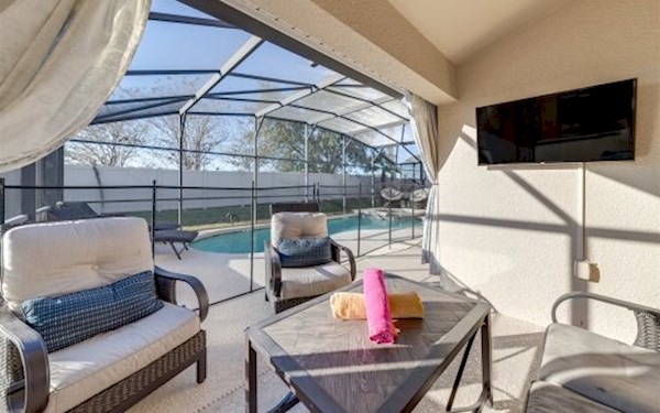 Outdoor seating area with TV